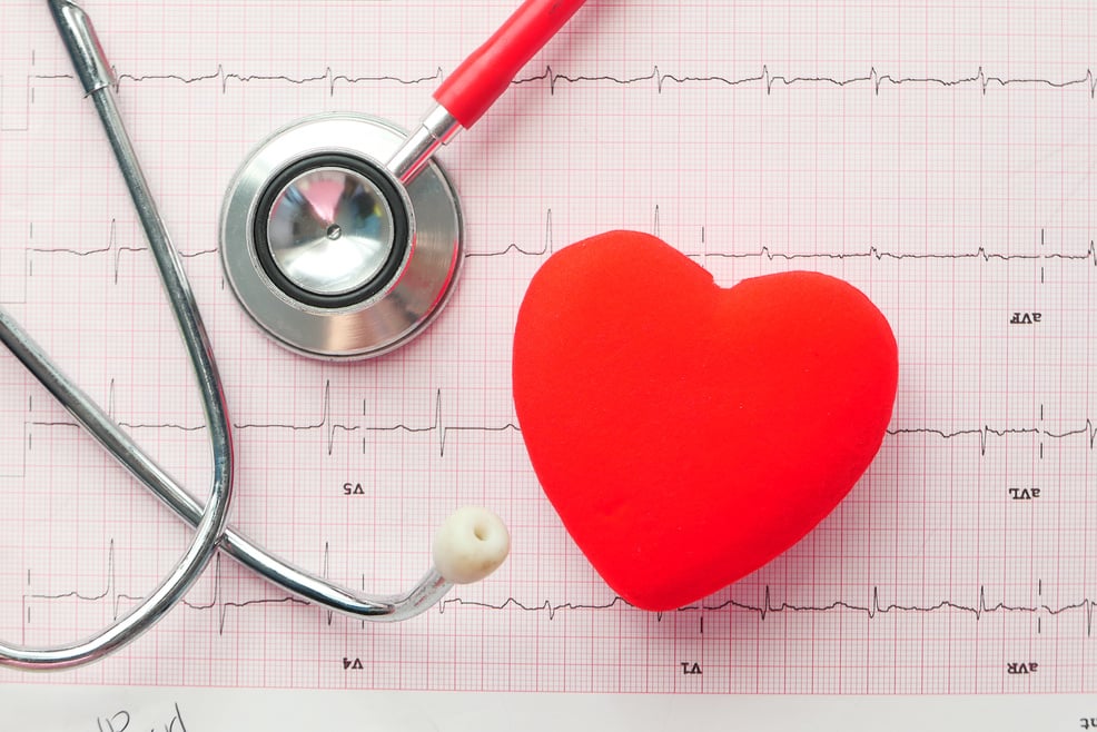 Stethoscope and Heart on a Cardio Diagram.